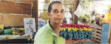  ?? — LISA MONFORTON ?? Ligia Escalante Lizano makes goods from coloured plastic bags.