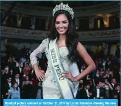  ??  ?? Handout picture released on October 31, 2017 by Latina Television showing the new Miss Peru 2017, Romina Lozano, on October 29, 2017, at the Municipal Theatre of Lima.