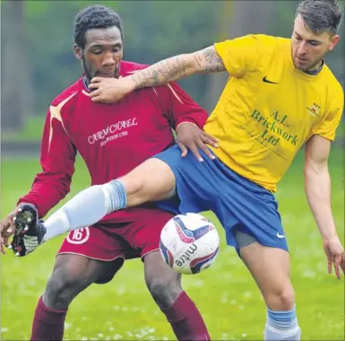  ?? FM3145754 ?? Rising Sun (yellow) and East Kent Gills get to grips with each other in the Challenge Cup semi-final