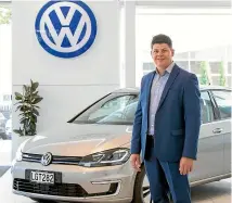  ??  ?? Ebbett Volkswagen dealer principal Poll Oosthuizen with one of the electric e-Golfs that the dealership will replace its loan car fleet with.