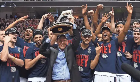  ?? KYLE TERADA, USA TODAY SPORTS ?? “It’s been a long, hard journey to get this program here,” said coach Mark Few, center, whose Gonzaga team is in the Final Four.