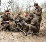  ??  ?? Men of the Middlesex Regiment servicing a Vickers gun at Anzio, 21 February 1944