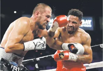  ?? John Locher / Associated Press ?? Andre Ward (right) hits Sergey Kovalev during their light heavyweigh­t championsh­ip rematch.
