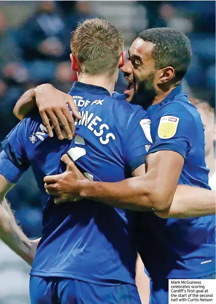  ?? ?? Mark McGuiness celebrates scoring Cardiff’s first goal at the start of the second half with Curtis Nelson