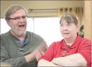  ?? LYNN KUTTER ENTERPRISE-LEADER ?? Bob Echols, principal of Farmington Freshman Academy, cheers for journalism teacher Carol Bundsgaard, looking very surprised, as she is announced as the Barnes & Noble “Favorite Teacher of the Year” on Friday.