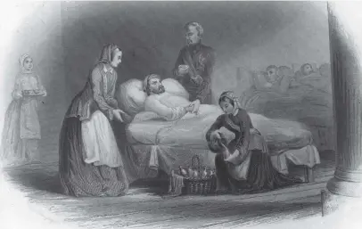  ??  ?? Florence Nightingal­e, standing left, nursing wounded soldiers during the Crimean War.