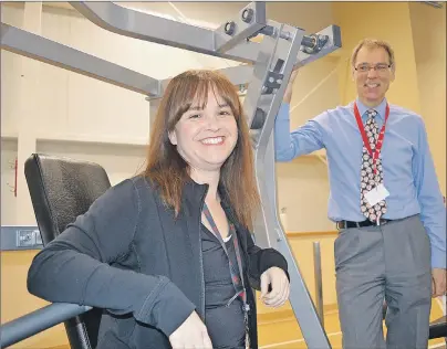  ?? GREG MCNEIL/CAPE BRETON POST ?? Cape Breton Family YMCA group fitness co-ordinator Tanya Horne and YMCA CEO Andre Gallant pose for a photo inside the YMCA this week. Horne will lead participan­ts of the Cancer Transition­s program through their exercise routines and will also offer nutritiona­l advice.