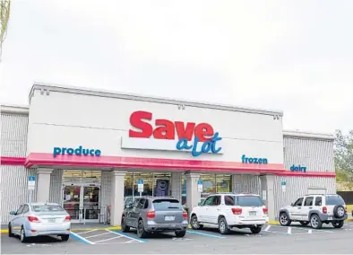  ?? WILLIE J. ALLEN JR./ORLANDO SENTINEL ?? Ascend Grocery has purchased 33 Save A Lot stores in the Orlando area, including this store in Longwood. The new owners have plans to renovate and expand the produce sections of the stores.