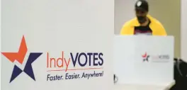  ?? MICHAEL CONROY/AP ?? A voter casts his ballot at the City-County Building in the final hours of early voting in the primary election in Indianapol­is on Monday.