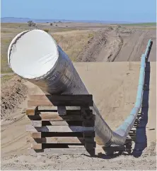  ?? AP FILE PHOTO ?? END IN SIGHT: A section of the Dakota Access Pipeline is shown under constructi­on near the town of St. Anthony in Morton County, N.D., in September.