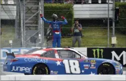  ?? DERIK HAMILTON — THE ASSOCIATED PRESS ?? Kyle Busch celebrates after winning the NASCAR Xfinity race at Pocono Raceway on Saturday in Long Pond.