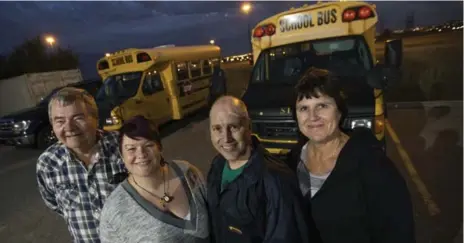 ?? RICK MADONIK/TORONTO STAR ?? From left, Bill Hunton, Kristi Dick, Gilles Boudreau and Martina Sauer. The school bus drivers from Edmonton are in the city helping out with the shortage.