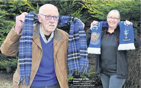  ??  ?? Cheering on the
Saints St Johnstone FC fan Tommy Hancock and neighbour Catherine Scott