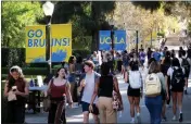  ?? DEAN MUSGROVE — LOS ANGELES DAILY NEWS — SCNG ?? Students at the University of California, Los Angeles, transition between classes in September at the Westwood campus.