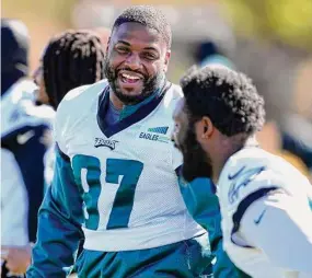  ?? Matt York/Associated Press ?? Eagles defensive tackle Javon Hargrave (97) laughs during a practice on Friday in Tempe, Ariz.