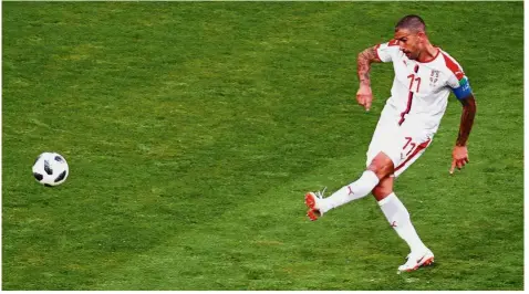  ?? — Reuters ?? Right on target: Serbia’s Aleksandar Kolarov scoring the winner.