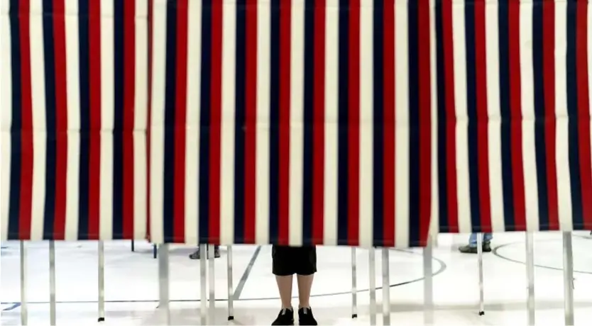  ?? ?? Un isoloir dans un bureau de vote de Manchester, New Hampshire, aux États-Unis, mardi 23 janvier 2024. David Goldman/Copyright 2024 The AP. All rights reserved.