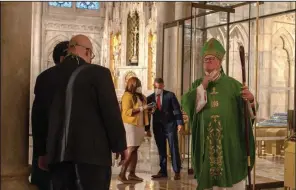  ?? (The New York Times/September Dawn Bottoms) ?? Cardinal Timothy Dolan after a Mass on June 28 at St. Patrick’s Cathedral in Manhattan.