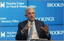  ?? NATHAN HOWARD — THE ASSOCIATED PRESS ?? Federal Reserve Chair Jerome Powell speaks at the Hutchins Center on Fiscal and Monetary Policy at the Brookings Institute on Wednesday in Washington. He says rates will remain high to fight stubborn inflation.