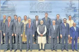  ?? PTI ?? Prime Minister Narendra Modi with the ministeria­l delegation from various countries on the sidelines of the Raisina Dialogue in New Delhi on Wednesday.