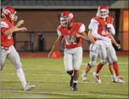  ?? AUSTIN HERTZOG - DIGITAL FIRST MEDIA FILE ?? Owen J. Roberts’ Aidan Hayward (54) is congratula­ted after a sack to force a turnover on downs against Upper Perkiomen in 2017.