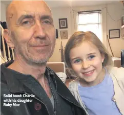  ??  ?? Solid bond: Charlie with his daughter Ruby Mae