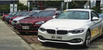  ??  ?? 160 BMW’s participat­ed in the 14th Bimmerfest Philippine­s 2017, hosted by the BMW Car Club of the Philippine­s (BMWCCP), held at the Uptown Parade parking grounds in BGC last August 13. The white BMW 420d Cabriolet (foreground), owned by Tey Sornet, won...