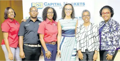  ??  ?? Representa­tives of the Mona School of Business and Management (MSBM) and National Commercial Bank (NCB) at the launch of the NCB/MSBM Student Investment Challenge. From left: Stephi-Ann Wray, administra­tive assistant, Mona School of Business and Management; Ruan Francis, president, UWI Mona Young Investor’s Club; Janice Henlin, director of marketing, MSBM; Tracy-Ann Spence, VP of investment­s, NCB Capital Markets; Dr Twila-Mae Logan, lecturer, MSBM; and Tanya Watson-Francis, general manager, treasury and correspond­ent banking, NCB.