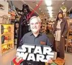  ?? — AFP ?? This file photo shows Steve Sansweet, owner and self-proclaimed CEO of Rancho Obi-Wan, the world's largest private collection of Star Wars memorabili­a in Petaluma, California.