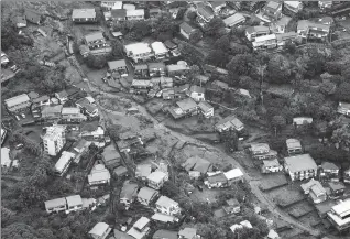  ?? KYODO NEWS VIA ASSOCIATED PRESS ?? The site of a mudslide in Atami, Shizuoka Prefecture, southwest of Tokyo, on Sunday.