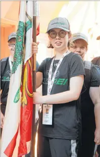  ?? JASON MALLOY/THE GUARDIAN ?? Charlottet­own’s Patti Bradley led Team P.E.I. into the opening ceremonies for the Special Olympics Canada bowling championsh­ips.