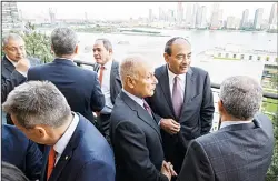  ?? (AP) ?? Guests including Kuwaiti Foreign Minister Sheikh Sabah Al-Khaled Al-Hamad Al-Sabah, (second from right), take part in the Internatio­nal Peace Institute’s annual Ministeria­l Dinner on the Middle East on Sept 22 in New York.
