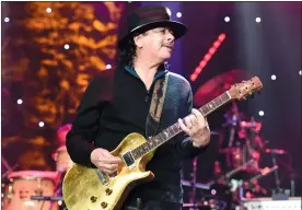  ?? ALBERTO E. RODRIGUEZ/GETTY IMAGES FOR THE RECORDING ACADEMY/TNS ?? Carlos Santana performs onstage during the Pre-Grammy Gala and Grammy Salute to Industry Icons Honoring Sean “Diddy” Combs on Jan. 25, 2020, in Beverly Hills, California.