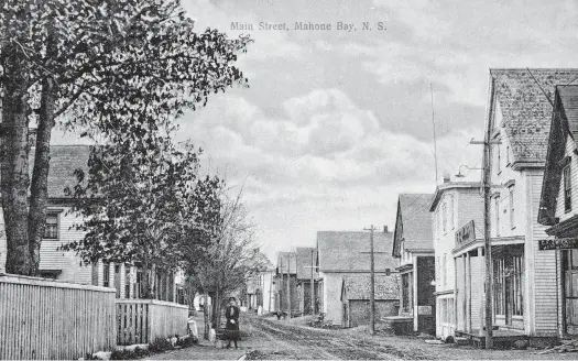  ??  ?? Main Street before hard-surfacing. PHOTO COURTESY OF THE MAHONE BAY MUSEUM