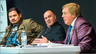  ?? Herald photo by Ian Martens ?? Chris Spearman answers a question next to fellow mayoral candidates Bob Janzen and Martin Heavy Head during an election forum hosted by SACPA Wednesday evening at the Lethbridge Public Library. @IMartensHe­rald