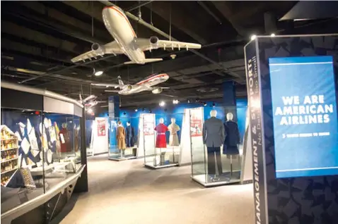  ??  ?? aboveModel planes hang from the ceiling of the American Airlines C.R. Smith Museum on Aug. 23 in Fort Worth, Texas. The newly renovated museum reopened Labor Day weekend.