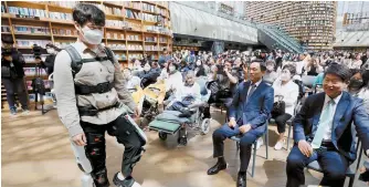  ?? Newsis ?? Angel Robotics demonstrat­es its walk assist robot at COEX convention center in Seoul, in this April 2023 photo.