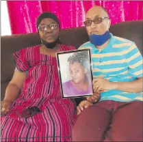  ??  ?? Want justice… Henry and Jaqueline Izaaks hold up a picture of the late Jennefer Daniels.
