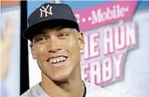  ?? AP Photo/Lynne Sladky ?? New York Yankees' Aaron Judge speaks with the media Monday before the All-Star Home Run Derby in Miami. Judge won the contest.
