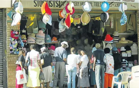  ?? /Marianne Pretorius ?? Street sales: The informal economy provides livelihood­s, work and income for more than 2.5-million workers and business owners, a fact seldom recognised by policy makers. One in six workers in SA is engaged in the sector, and it has the potential to...