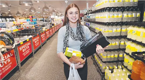  ??  ?? Kaili Thompson from Caboolture shopping at Aldi Chermside.