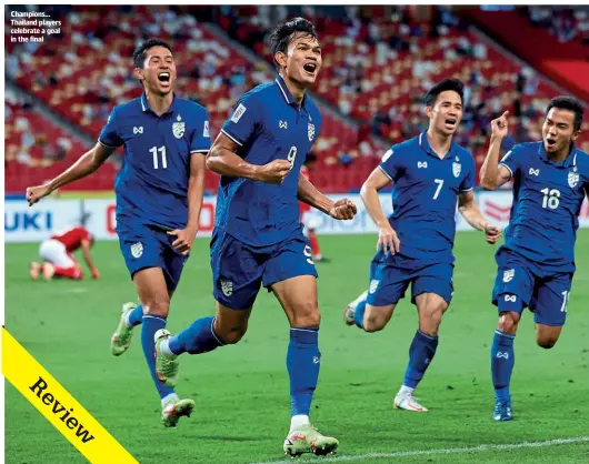  ?? ?? Champions… Thailand players celebrate a goal in the final
