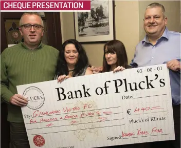  ??  ?? Helen Alderton, owner of Plucks of Kilmacanog­ue and Christmas Fair co-ordinator Kathleen Tighe presenting Colm Mulligan and Paddy Byrne of Glencormac United with a cheque for €440 for the club, proceeds of the various stall holders donations at the Christmas Fair. Glencormac United are very grateful to everyone for their continued support.
