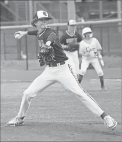  ?? Scott Herpst ?? Blaine Logan gets set to deliver to the plate during Gordon Lee’s game at Ringgold early last week. Teams will wrap up the regular season this week and get set for the NGAC playoffs starting Monday, April 22