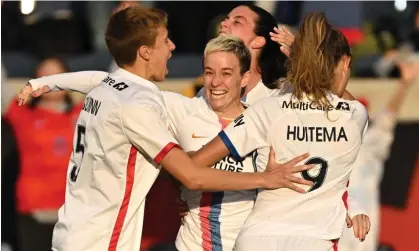  ?? ?? Megan Rapinoe celebrates with teammates after scoring her first goal against Chicago Red Stars. Photograph: Daniel Bartel/USA Today Sports