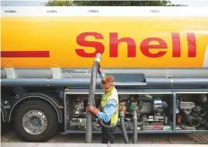  ?? Bloomberg ?? ■ A Shell tanker truck at a gas station in Rotterdam. Shell came under fire as its downstream division was blamed for its adjusted net income for the second quarter