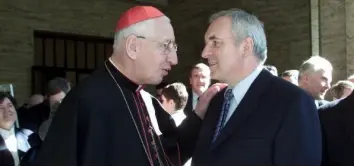  ??  ?? MOURNED: Cardinal Desmond Connell’s coffin at his funeral Mass at St Mary’s Pro-Cathedral Dublin (top), and the cardinal with then Taoiseach Bertie Ahern (above) at a State reception in 2001 that was hosted by Ahern and his partner Celia Larkin