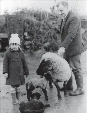  ??  ?? LEFT: Mr. Danny Mccarthy, Ballytrasn­a, Faha, with his twin lambs which were born on New Year’s Day on his farm in January 1982. Also included is Mr. Mccarthy’s second cousin Caroline Cronin, of Fossa, Killarney.