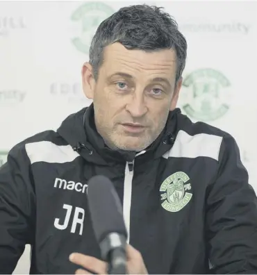  ??  ?? 0 Hibs manager Jack Ross addresses the media after a training session at East Mains yesterday.
