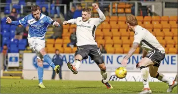  ??  ?? OVER AND OUT: Danny Swanson’s first-time finish in 81 minutes was St Johnstone’s killer third goal